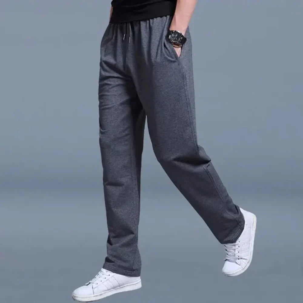 Pantalon de survêtement à cordon de serrage avec poches latérales pour hommes