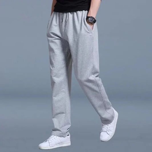 Pantalon de survêtement à cordon de serrage avec poches latérales pour hommes