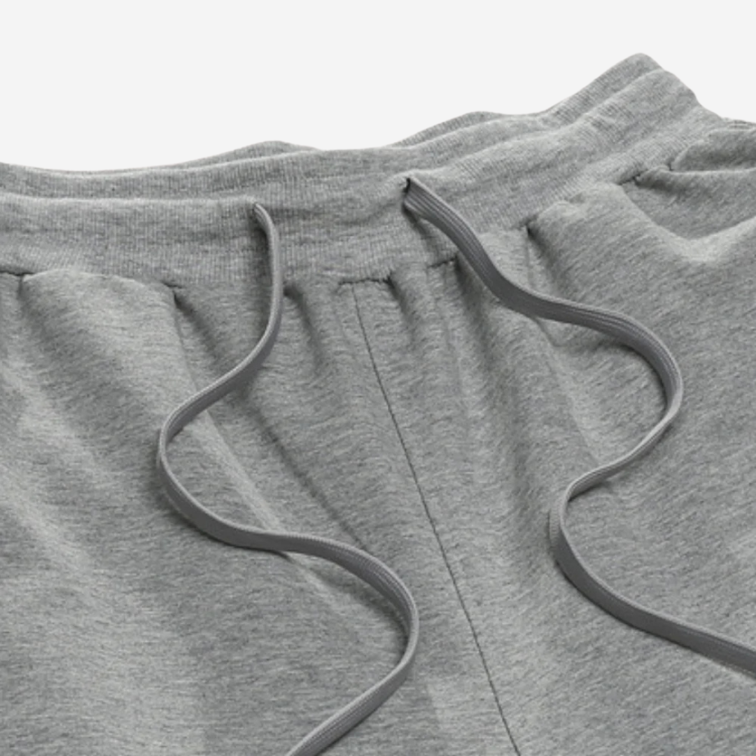 Pantalon de survêtement à cordon de serrage avec poches latérales pour hommes